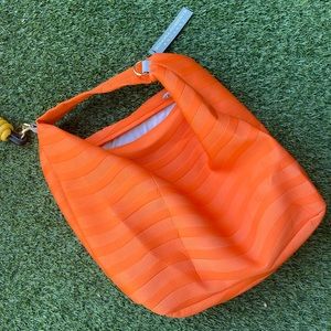 Brand new Sandra Roberts Squared wave neoprene hobo bag